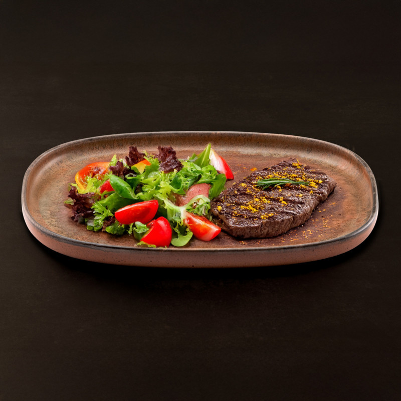 Assiette à steak ovale orange grès émaillé Ø 33 cm 33x33 cm Planet Medard De Noblat